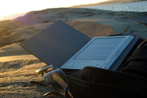 e-reader on the beach